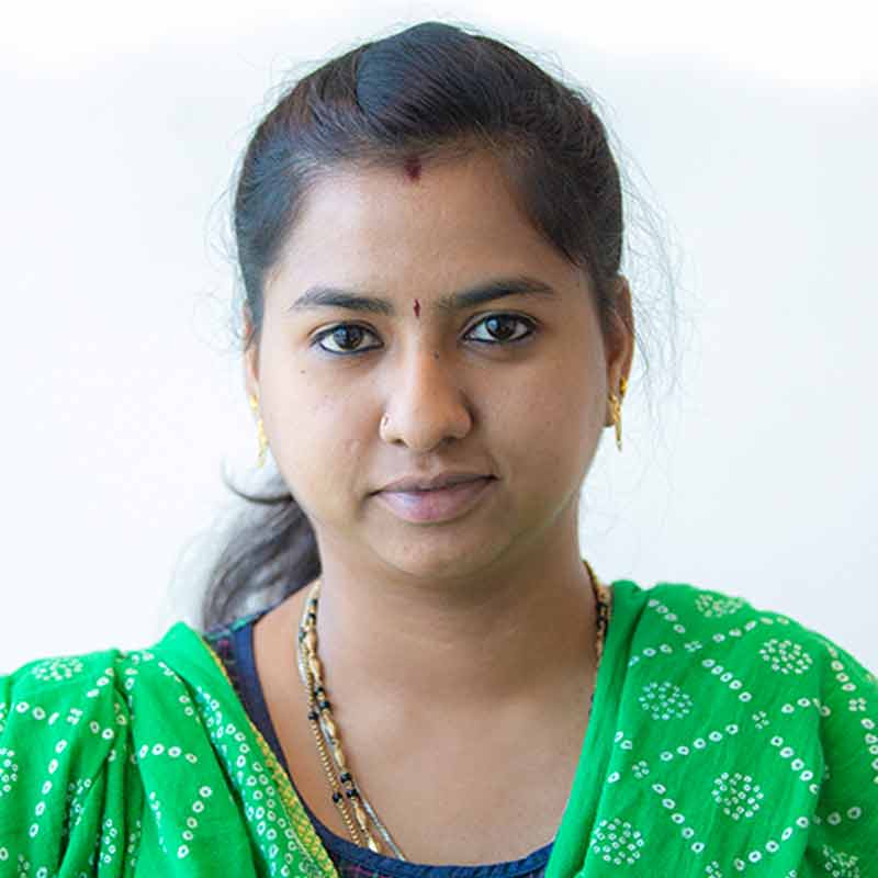 A corporate headshot of Santhi Santhanakrishnan